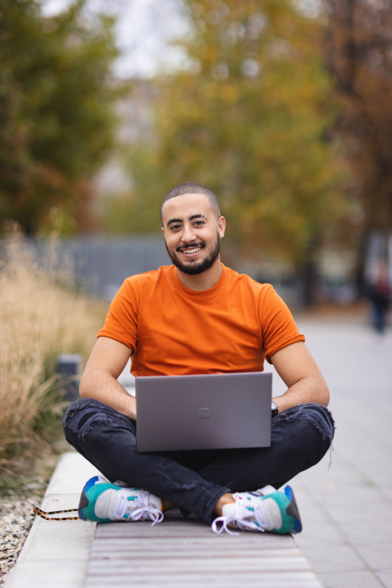Admissions process stages | WSB Merito Bydgoszcz University: Student with a laptop